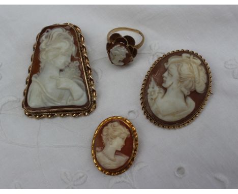 A shell cameo brooch depicting a lady in profile, in a yellow metal mount together with two other cameo brooches and a cameo 