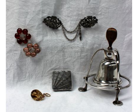 A George V silver bell, Birmingham, 1911, in an electroplated desk mount together with a silver powder compact, and costume j