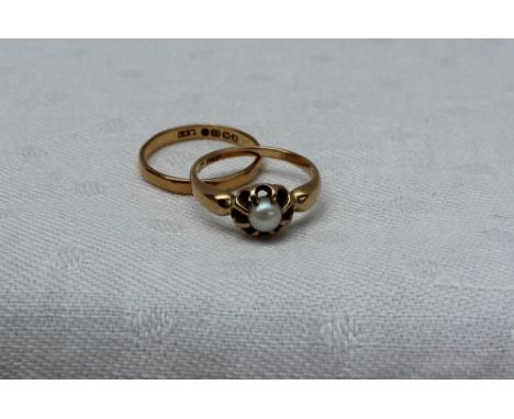 A 22ct yellow gold wedding band, approximately 1.9 grams together with pearl set ring in a yellow metal setting and shank, ap