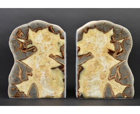 * Calcite Bookends. A pair of Septarian Calcite bookends, the boulder cut in half to give a symetrical finish, from Utah, USA