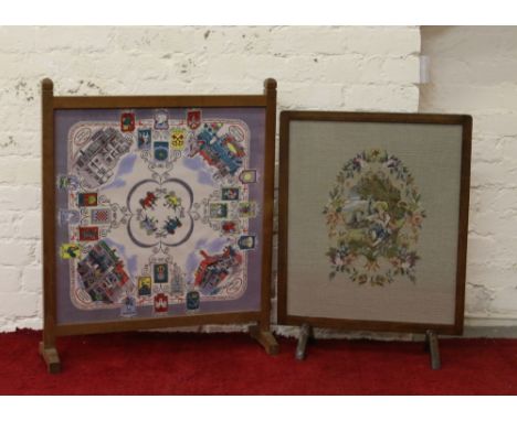 An oak firescreen with silkwork tavern and public house signs along with a woolwork example.