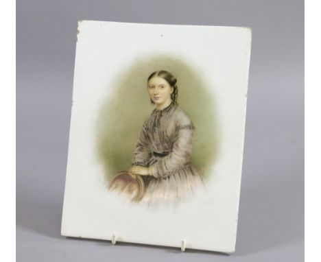S Chesters. Porcelain plaque with a hand enamelled portrait of a young girl. Signed and dated 1869.