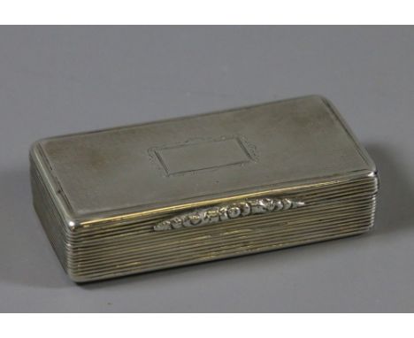 A Georgian silver snuff box with engine turned decoration.
