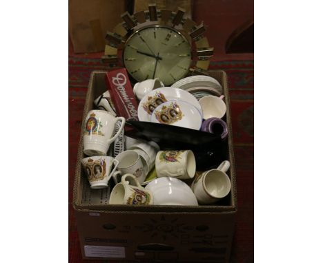 A box of ceramics and glass to include commemorative wares, mantel clock, decorative wall clock, ornaments, etc.