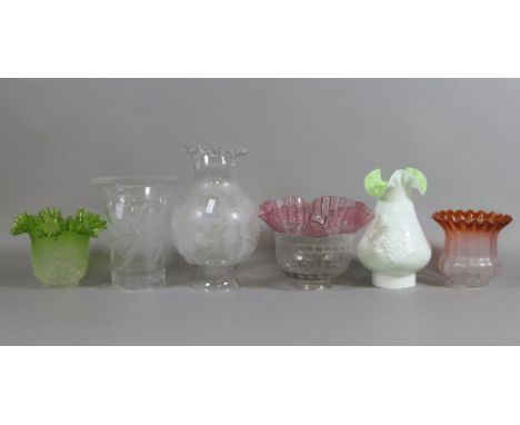 A collection of Victorian oil lamp shades to include coloured and etched example.