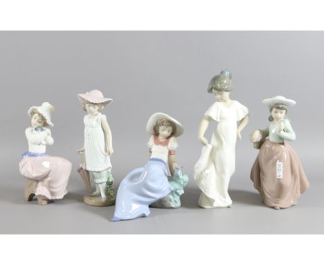 Five Nao figurines modelled as various young girls.