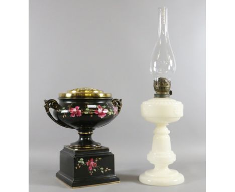 A milk glass oil lamp together with a ceramic rose bowl.