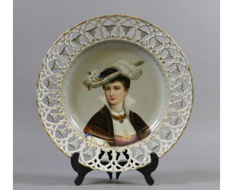 A C19th continental Meissen style cabinet plate with pierced and moulded border painted to the centre with a portrait of a no