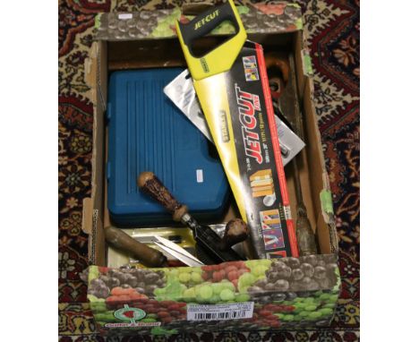 A box and contents of various tools to include Makita examples.