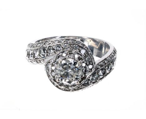 Impressive white gold diamond cross-over design dress ring, the principle centre diamond 0.65ct, clarity I1, colour I/J,  7.8