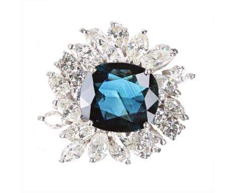 Good fancy and large 18k white gold sapphire and diamond dress cluster ring, the oval cushion-cut sapphire 4.50ct approx, in 