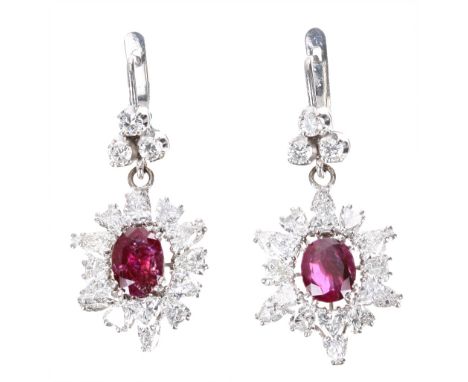 Pair of fine white gold ruby and diamond cluster drop earrings, the oval rubies 1.75ct and 1.90ct approx, with round brillian