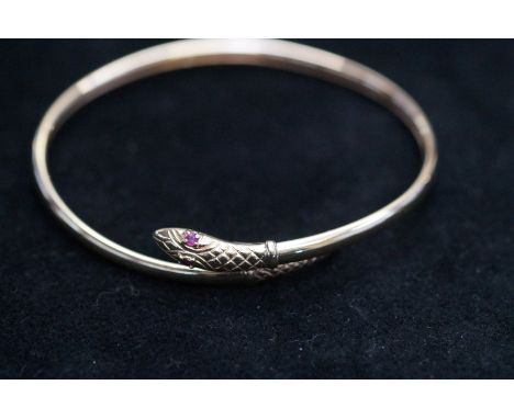 9ct Gold ruby eyes snake bracelet Weight 8.5g