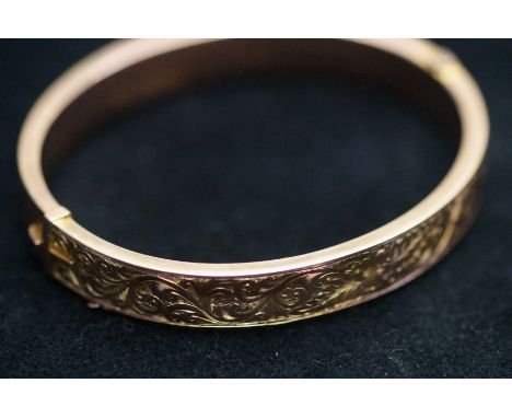 9ct Rose gold bangle with safety chain Weight 12.1 g