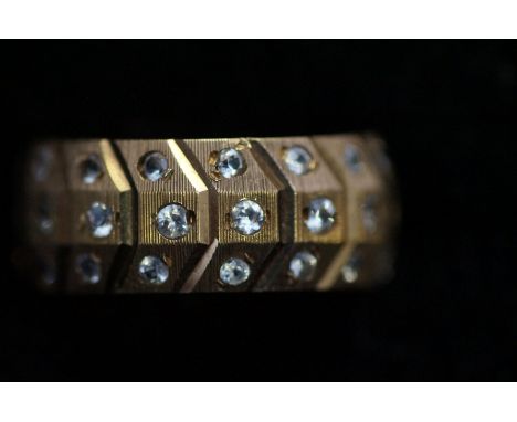 Yellow metal ring tested for high carat gold set with 48 white stone Size M 