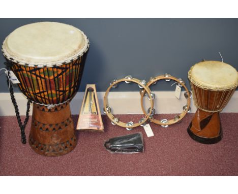 Two African-style drums, two tambourines, a cowbell and a Wittner metronome.