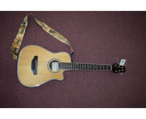 A Turner electric acoustic guitar, Model RV20 Junior, dated and signed, 85cms long, cased.