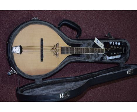 An Ozark Celtic Model Electro Mandolin 2240E, 69cms long, cased.