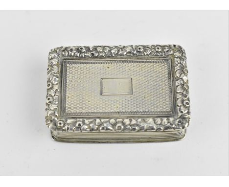 A William IV silver vinaigrette by Thomas Wilkes Barker, London 1836, of rectangular form with engine turned detail and flora