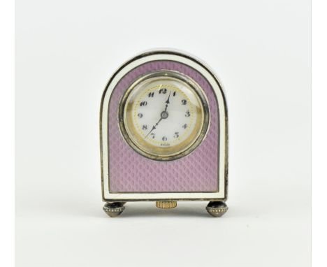 A miniature Austrian silver and enamel timepiece, the case with purple guilloche enamel, white enamel banding on a silver gro