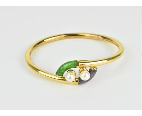 An 18ct yellow gold, enamel and pearl bangle by Gaston Lebo, with opening at the front, the two entwined ends with green and 