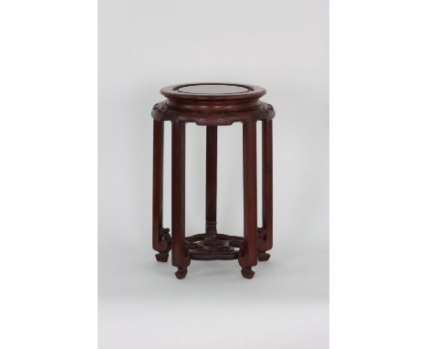 A Chinese rosewood planter, 20th century        Delicately carved.    Width 30 cm height 48 cm
