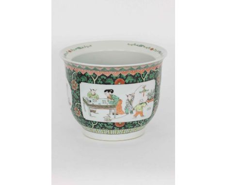 A Chinese famille verte fish planter, 20th Century        With a garden scene of playing children.    Width 27 cm height 21 c