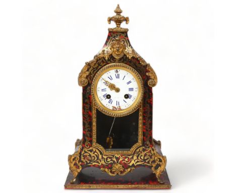 19th century tortoiseshell and brass Boulle marquetry mantel clock, enamel dial and 8-day movement striking on a bell, height