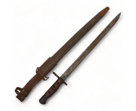 US Army military bayonet in original leather scabbard, overall length 57cm, blade length 43cm, blade dated 1917Good condition