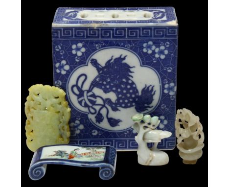 3 small jade carvings, largest 7.5cm, Chinese blue and white porcelain pillow, height 14cm, and a small Chinese porcelain sta