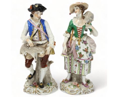 Pair of Sitzendorf porcelain shepherd and shepherdess figures, height 20cmThe lady's arm and stick have been broken and resto