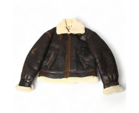 A good quality pilot aviator style jacket, brown leather and fleece-lined, size small/mediumGood condition with light wear on