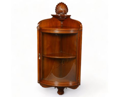 Good quality Victorian mahogany wall-hanging corner display cabinet, with carved shell pediment and bow glass door, height 11