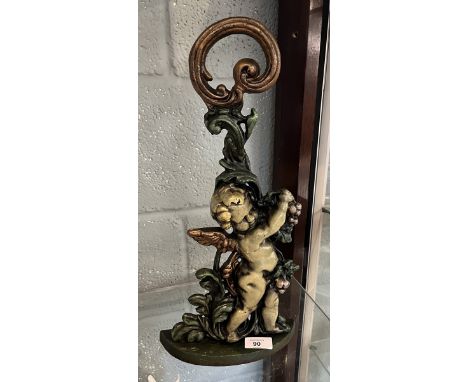 Cast iron cherub door stop 