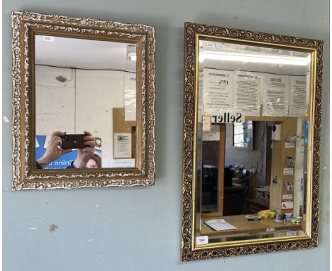 Gilt frame bevel glass mirror together with another 