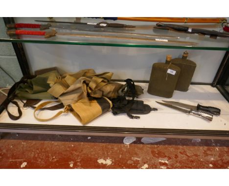 SA80 bayonet together with another and first aid pouches and water bottles etc. 