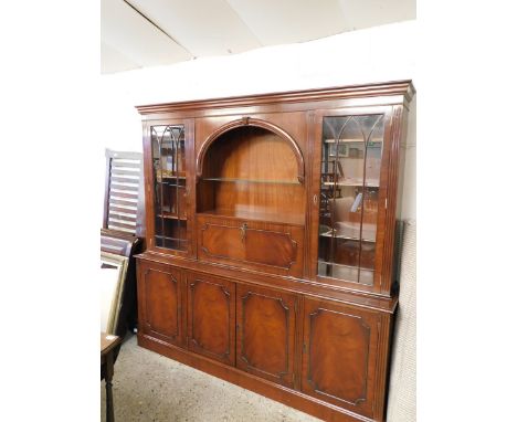 REPRODUCTION MAHOGANY FRAMED LIVING ROOM DISPLAY CABINET WITH CENTRAL ARCHED OPEN SHELF WITH DROP DRINKS CABINET FLANKED EITH