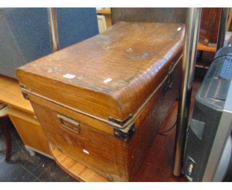 A metal travel trunk