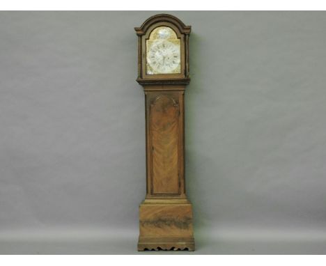 A walnut cased longcase clock