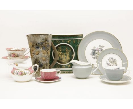 A Royal Albert 'Lady Carlyle' pattern part teaset, decorated with floral sprays, together with a Worcester 'Woodland' pattern