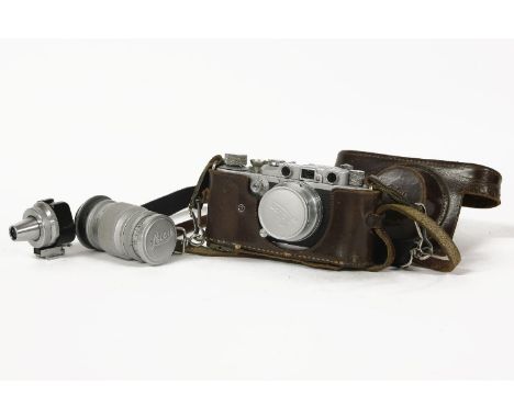 A Leica IIIa Rangefinder camera, together with leather case, an additional lens, rangefinder