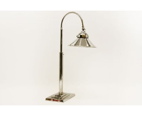 A nickel plated students lamp, with conical shade and oblong base, 57 cm high