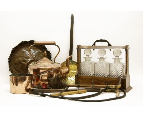 An early 20th century oak and silver plated tantalus,together with a hunting crop, a hunting trophy holder, copper kettle, sa