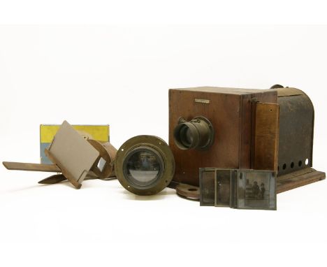 A magic lantern by J Lancaster & Son, Birmingham, various glass slides, glass negatives, magic lantern slides, stereoscopic v