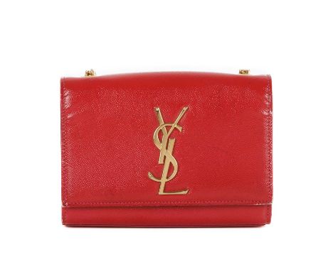 Yves Saint Laurent, a Kate Flap handbag, crafted from red textured patent leather, featuring polished gold-tone hardware, lar