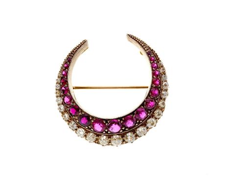 A late Victorian silver and gold, ruby and old-cut diamond crescent brooch, estimated total ruby weight 4ct, estimated total 