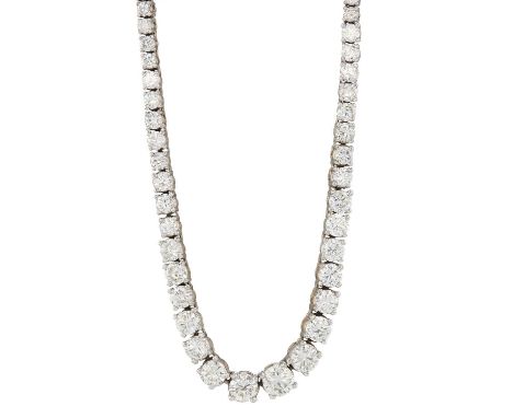 An impressive graduated brilliant-cut diamond line riviere necklace, with push piece clasp and safety catch, total diamond we