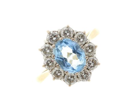 An 18ct gold aquamarine and brilliant-cut diamond cluster dress ring, aquamarine estimated weight 1.10ct, estimated total dia
