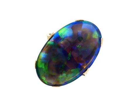 An early 20th century 9ct gold black opal cabochon single-stone dress ring, opal estimated weight 9.90ct, band stamped 9ct, r