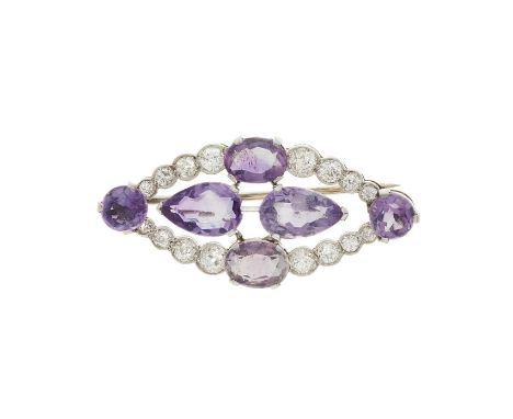 An early 20th century vari-shape amethyst and diamond openwork brooch, estimated total diamond weight 1ct, H-I colour, SI cla